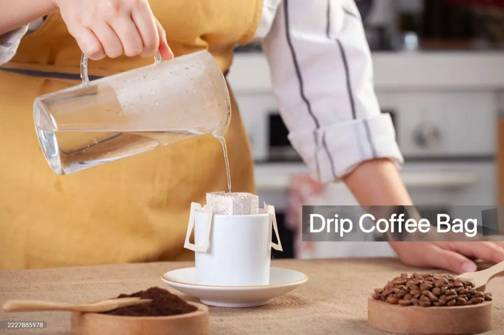 A drip coffee bag hanging conveniently on the side of a mug