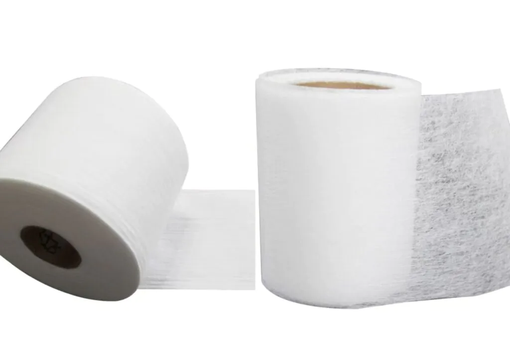 A collection of different non-woven filter materials, showing various textures and thicknesses