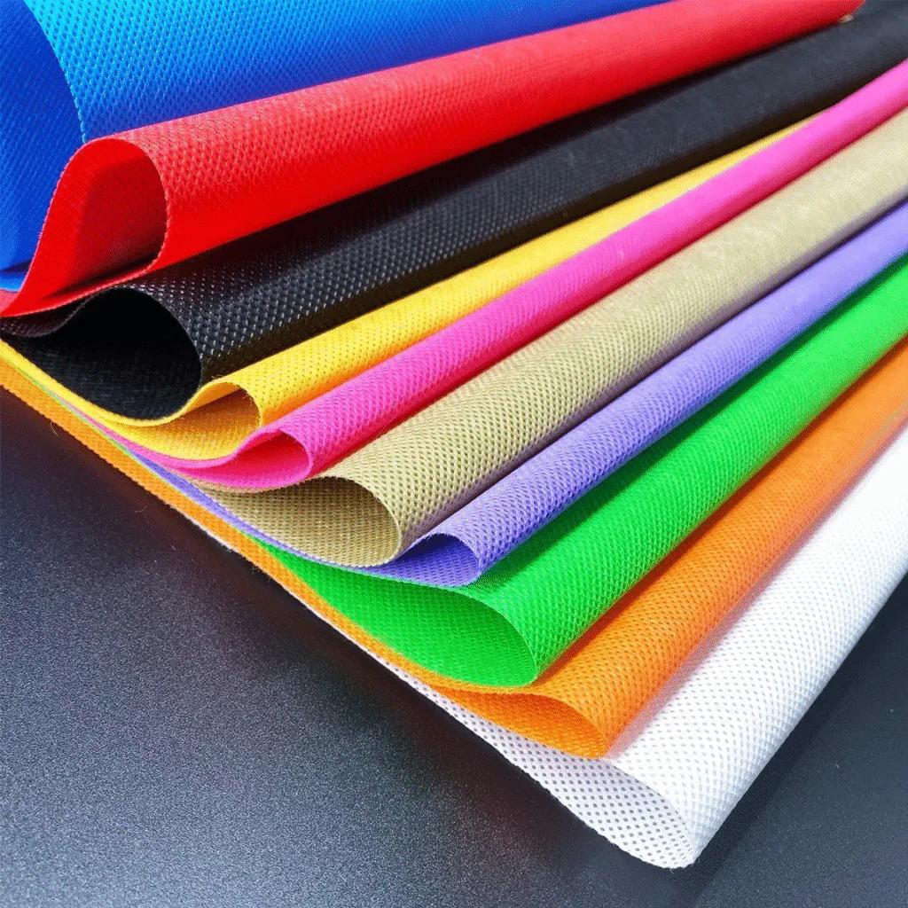 A collection of colorful non-woven fabrics used for different layers of face masks